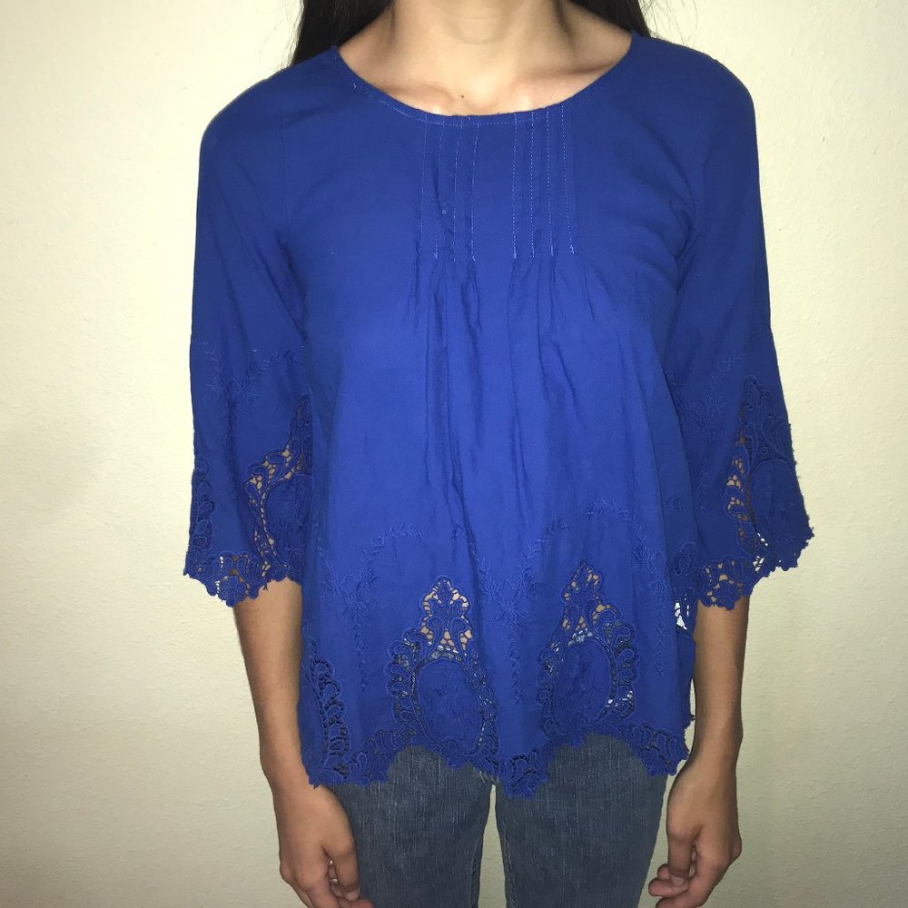 Blue girls blouse with eyelet details